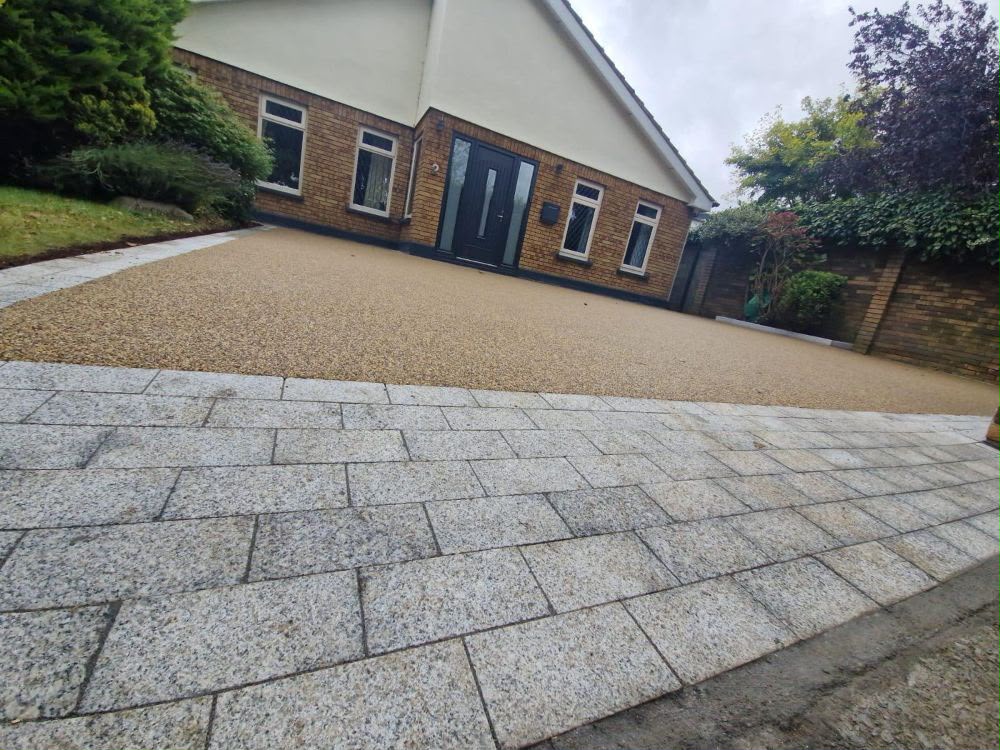 Resin driveway with stone paving foreground